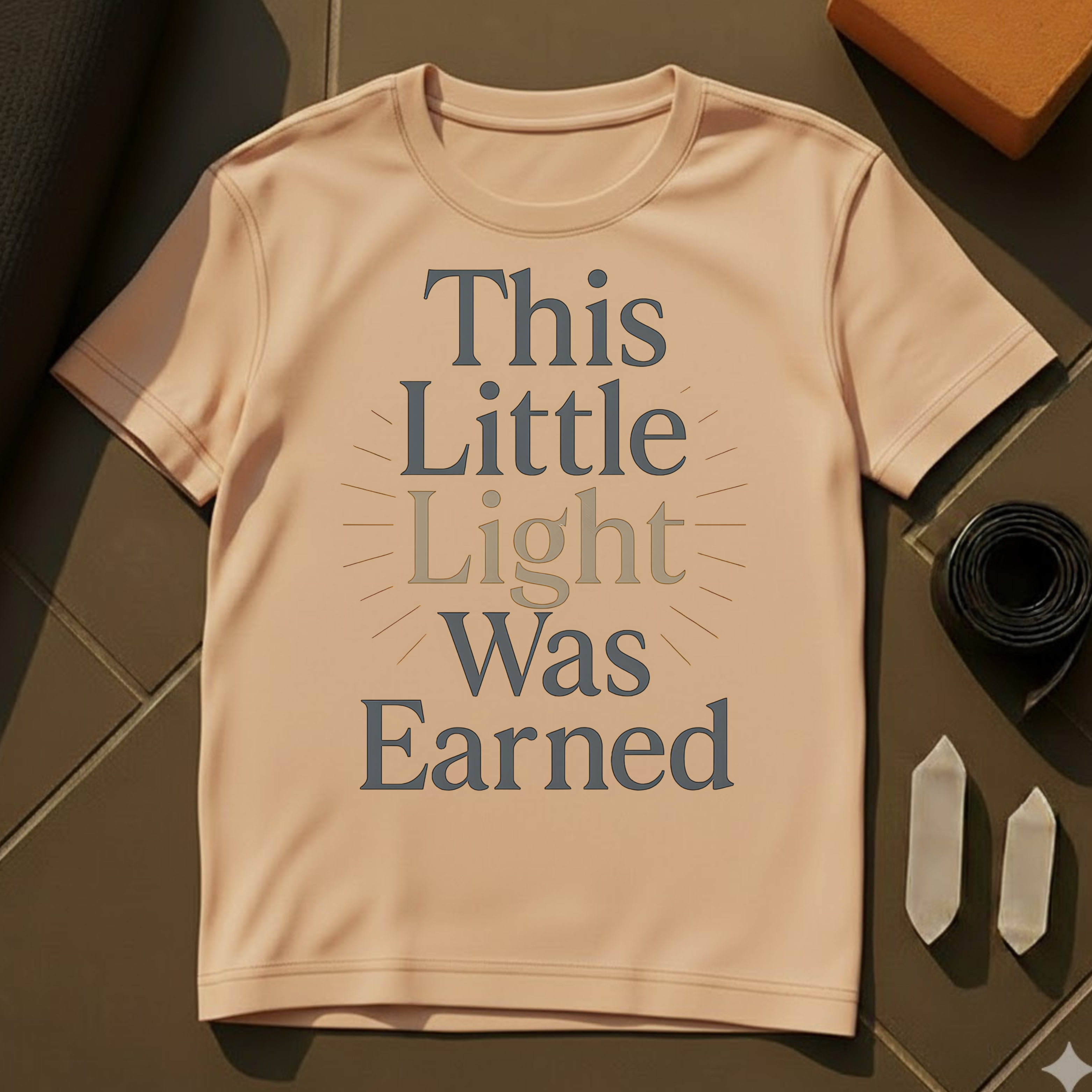 This Little Light Was Earned T-Shirt | Resilience & Inner Glow Cotton Tee